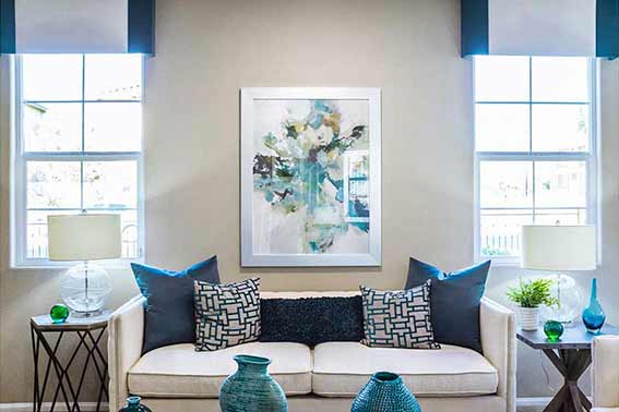 Picture framing ideas in a blue room